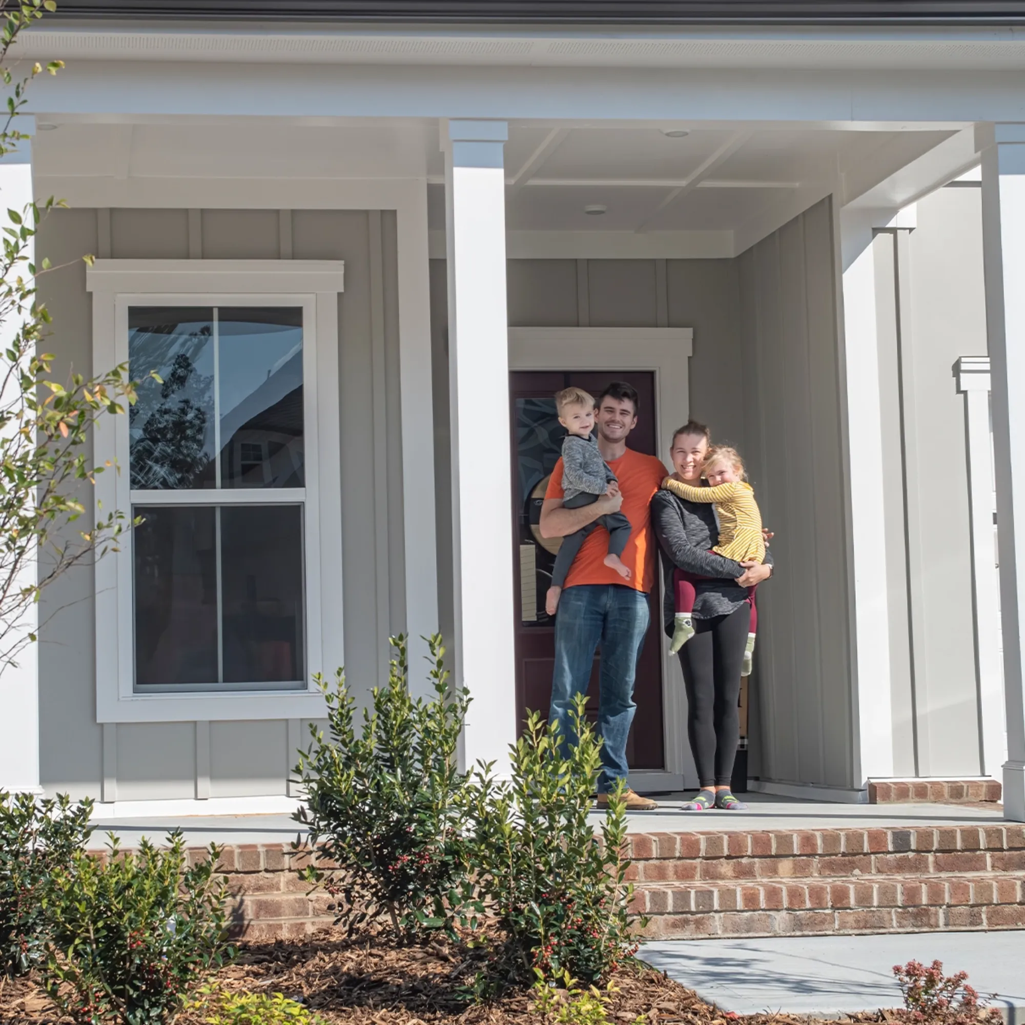 Happy family in their new home